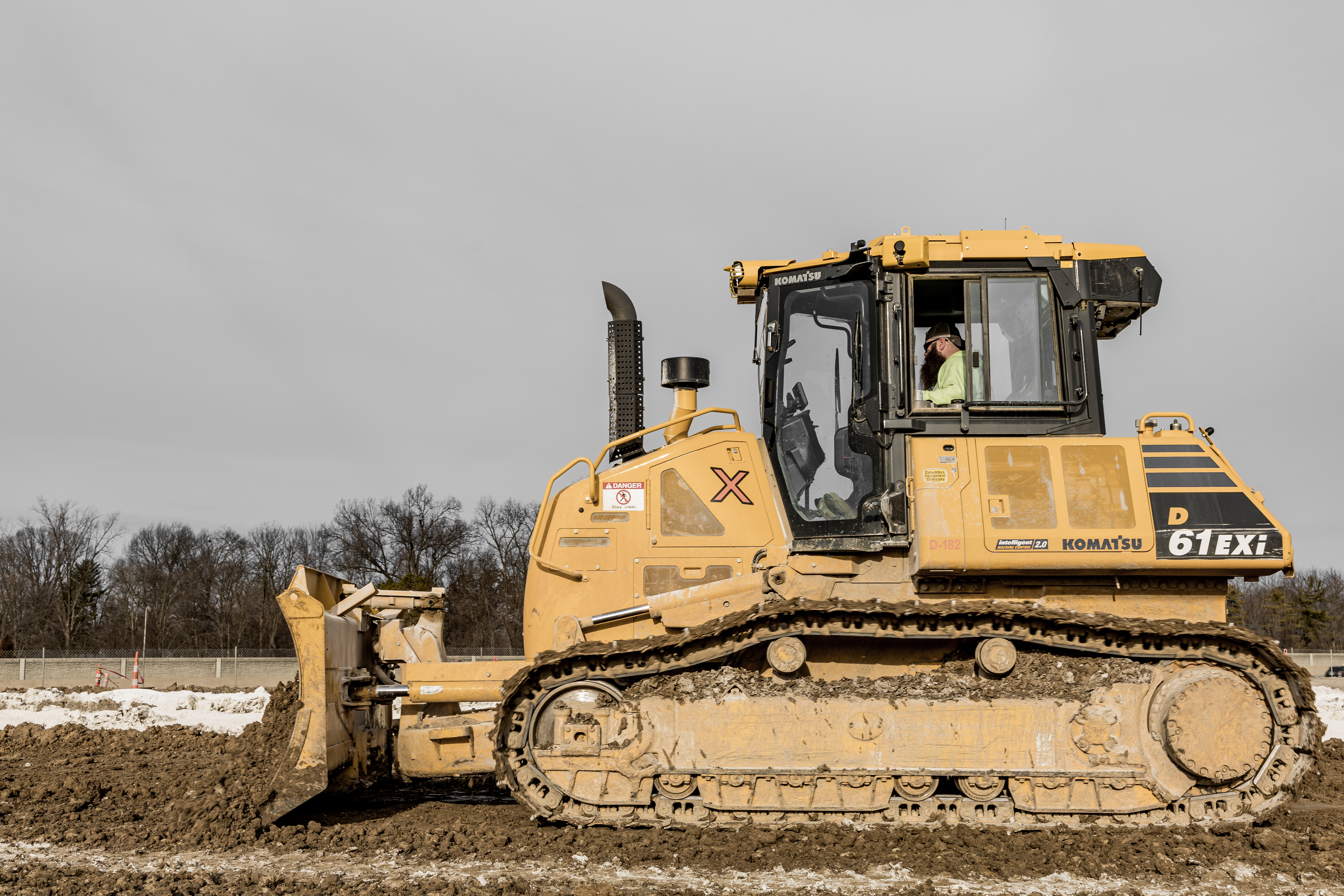 A man operating construction equipment